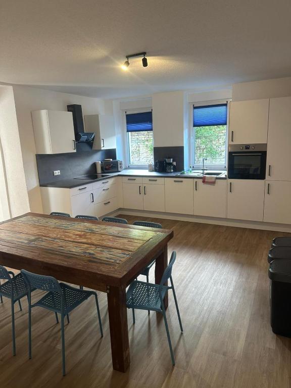 Wohnung Armsheim mit Parkplatz und 3 Schlafzimmer für 9 Personen, EG